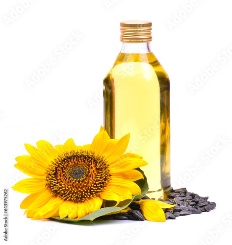 Sunflower with bottle of oil on a white background