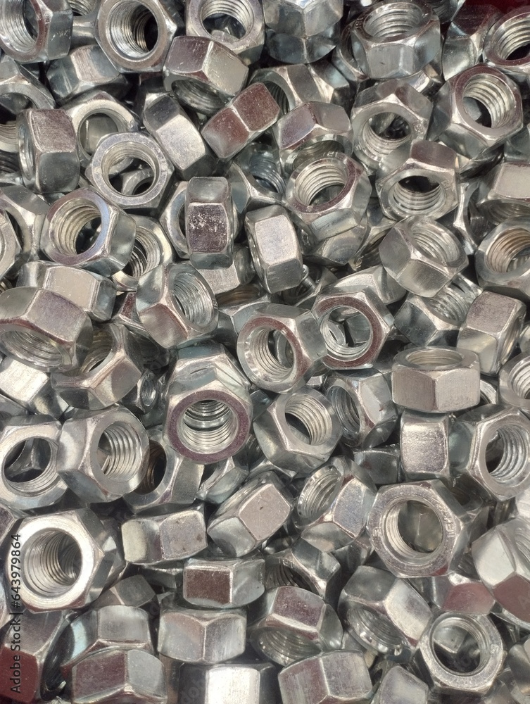placer of iron bolts, construction fasteners, industrial background