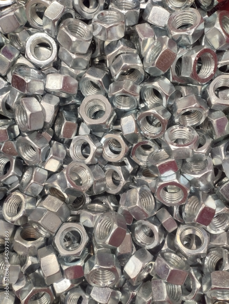placer of iron bolts, construction fasteners, industrial background