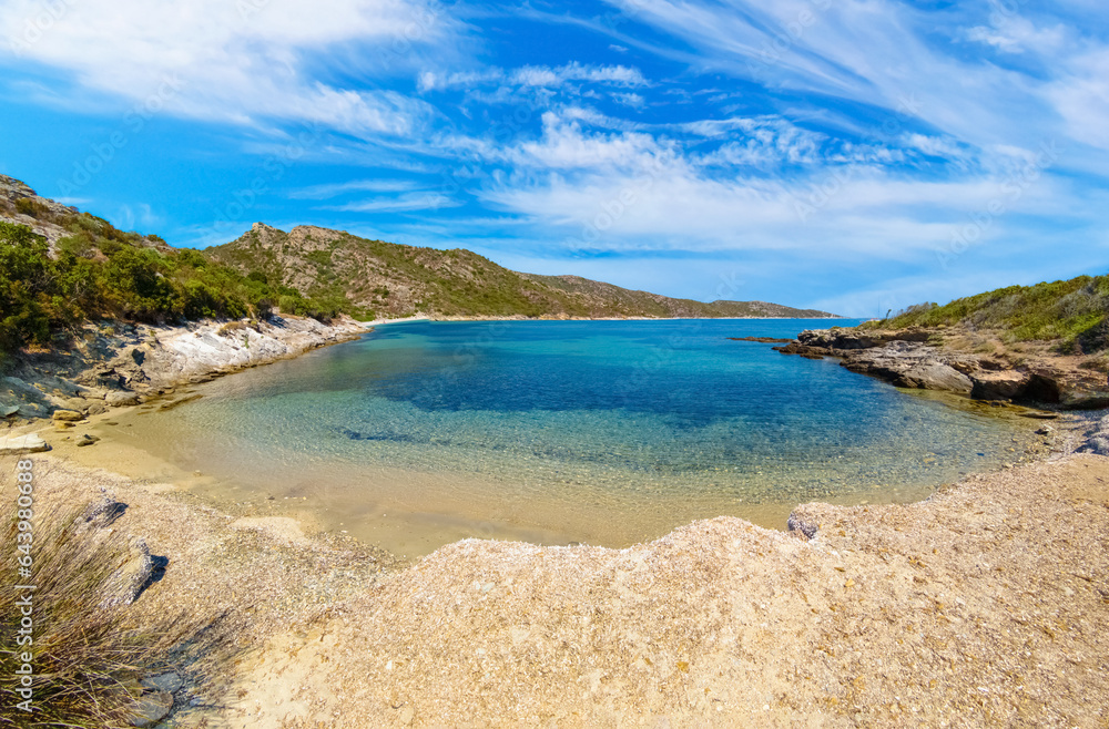 Corse (France) - Corsica is a big touristic french island in Mediterranean Sea, with beautiful beachs and mountains. Here a view of the Sentier du littoral from Saint-Florent at Plage de Lotu - obrazy, fototapety, plakaty 