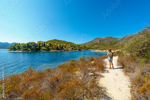 Corse (France) - Corsica is a big touristic french island in Mediterranean Sea, with beautiful beachs and mountains. Here a view of the Sentier du littoral from Saint-Florent at Plage de Lotu photo