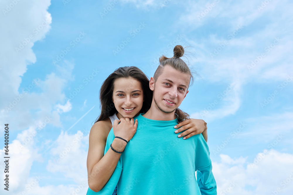 Happy cheerful teenage friends having fun together on beach. Happy cheerful teenage friends having fun together on beach.