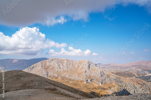 The scenic view of Feslikan Plateau and Alaben Mountain  which looks as if it has its back  consists of spread neighborhoods and looks like it is nestled inside a pit when viewed from the sky. 