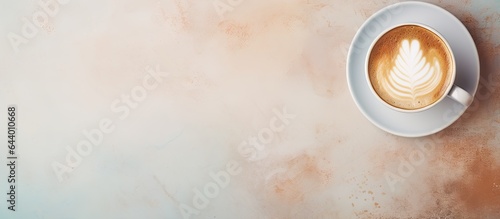 Fresh coffee cup on cafe table isolated pastel background Copy space