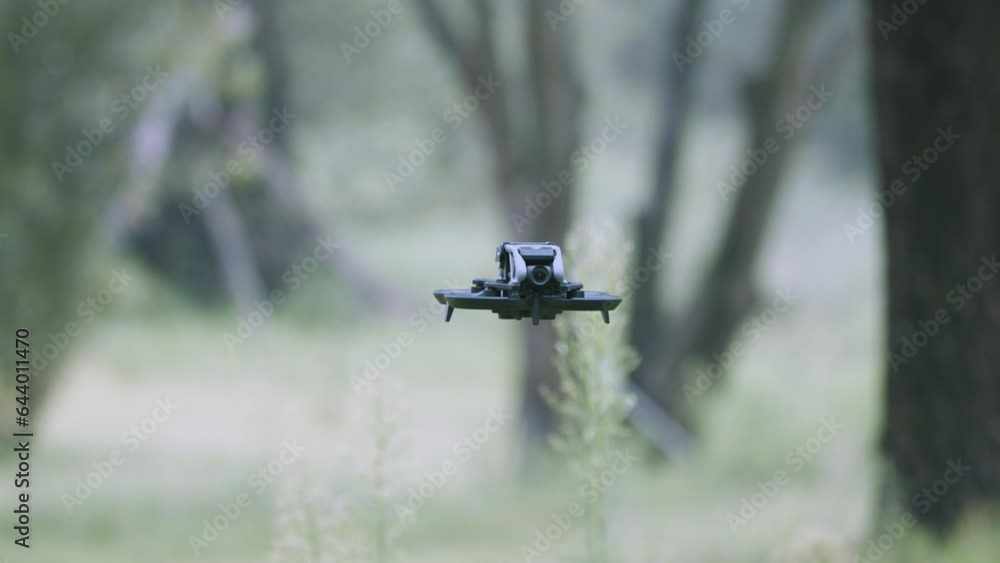 FPV Drone Hovering On Green Meadows FPV Drone Hovering On Green Meadows