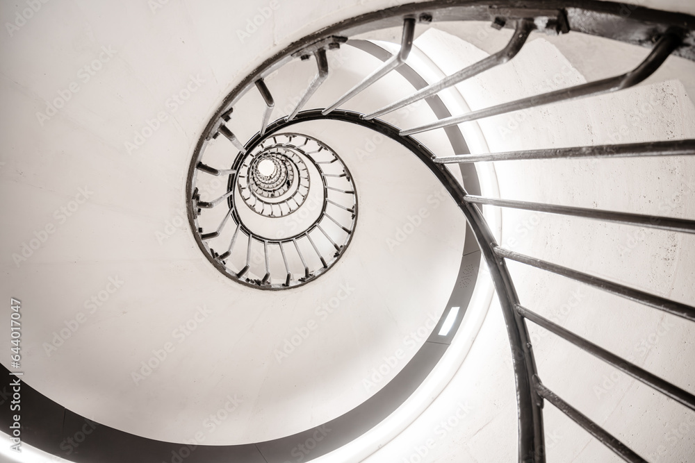 Obraz premium Old vintage spiral staircase. Black and white photography.