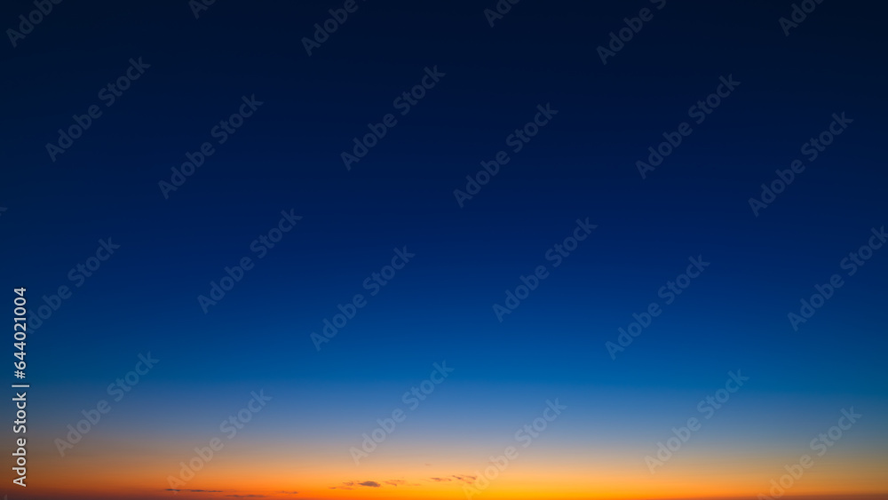 Color gradient on the sky. Sky with clouds during sunset. Clouds and blue sky. Photo for design and background.