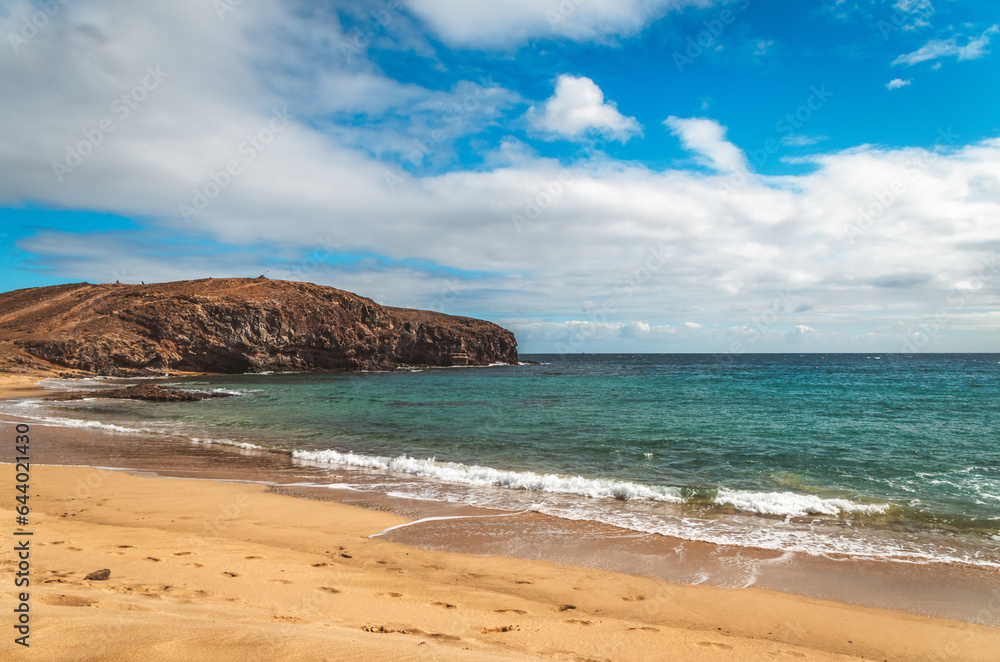 Serene Beauty: Lanzarote's Rocky Coastline by the Sea