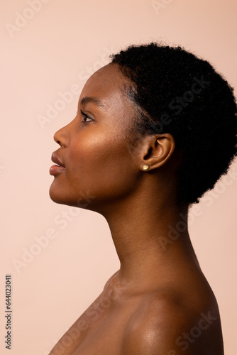 Profile of african american woman with short hair looking up