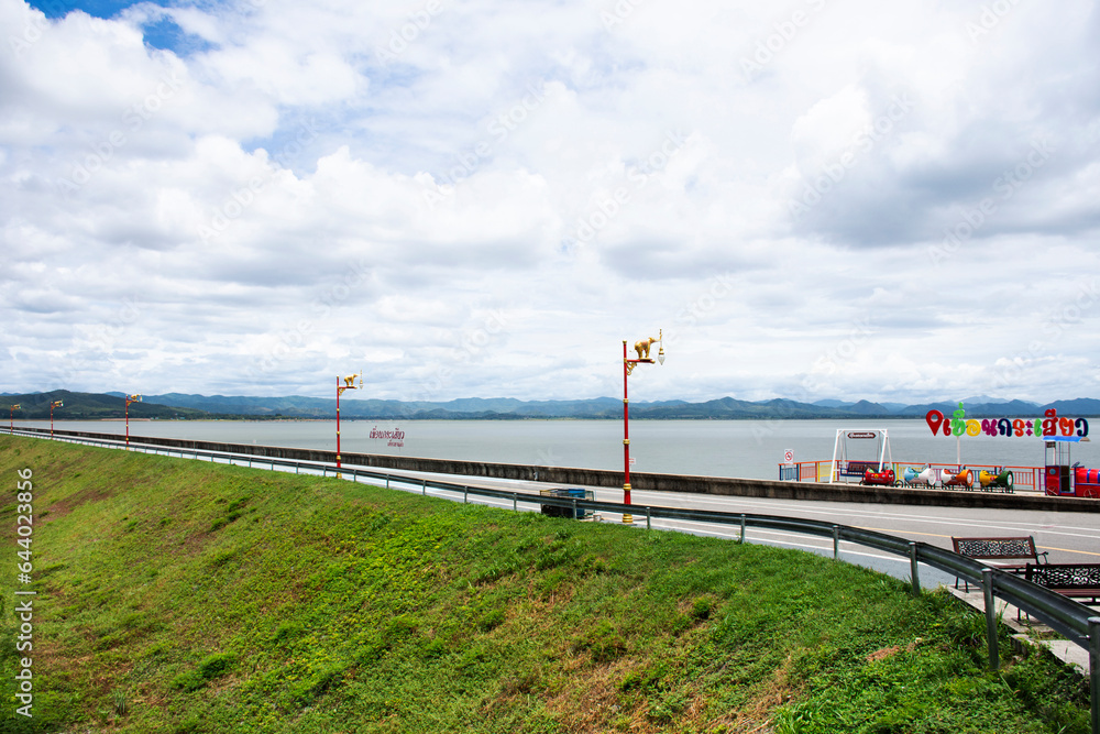 View landscape mountain and street road on crest reservoir of Krasiao dam at viewpoint for thai people travelers travel visit rest relax at Suphanburi city on August 24, 2023 in Suphan Buri, Thailand