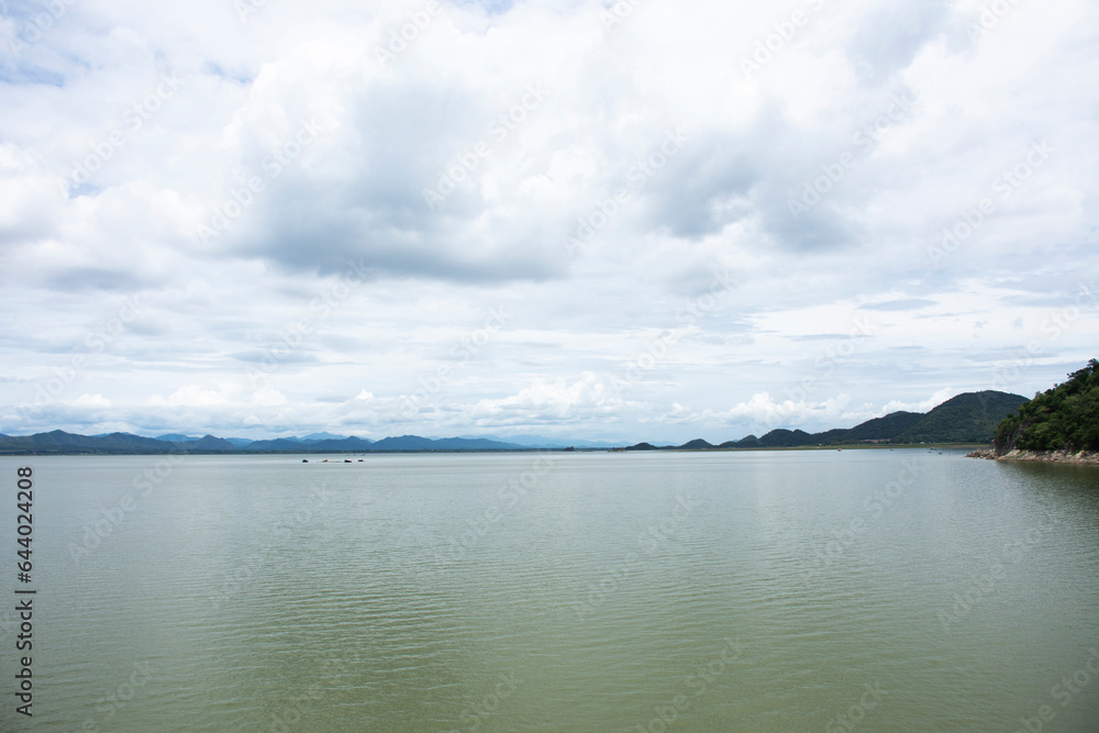 View landscape water lake and mountain in Krasiao Dam at Dan Chang district for thai people and foreign travelers travel visit rest relax on crest reservoir at Suphanburi city in Suphan Buri, Thailand