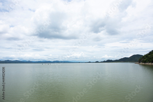 View landscape water lake and mountain in Krasiao Dam at Dan Chang district for thai people and foreign travelers travel visit rest relax on crest reservoir at Suphanburi city in Suphan Buri, Thailand