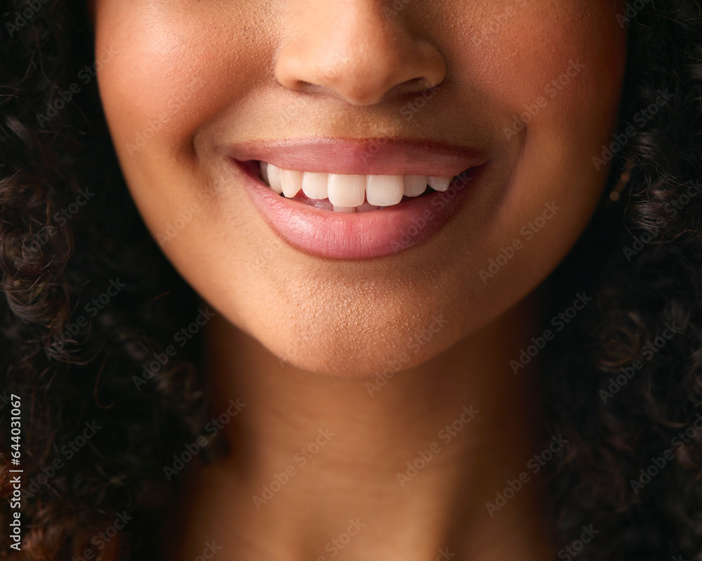 Close Up Studio Portrait Showing Mouth And Teeth Of Smiling Natural Woman Close Up Studio Portrait Showing Mouth And Teeth Of Smiling Natural Woman
