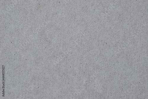 A sheet of gray recycled cardboard texture as background 