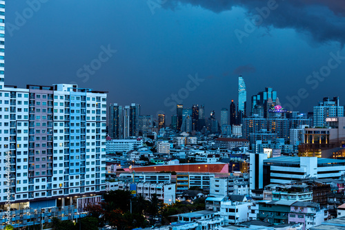 The background of rain clouds covering a condominium building, as a rainstorm is about to occur and strong winds blow.