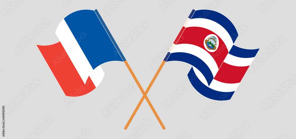 Crossed and waving flags of France and Costa Rica