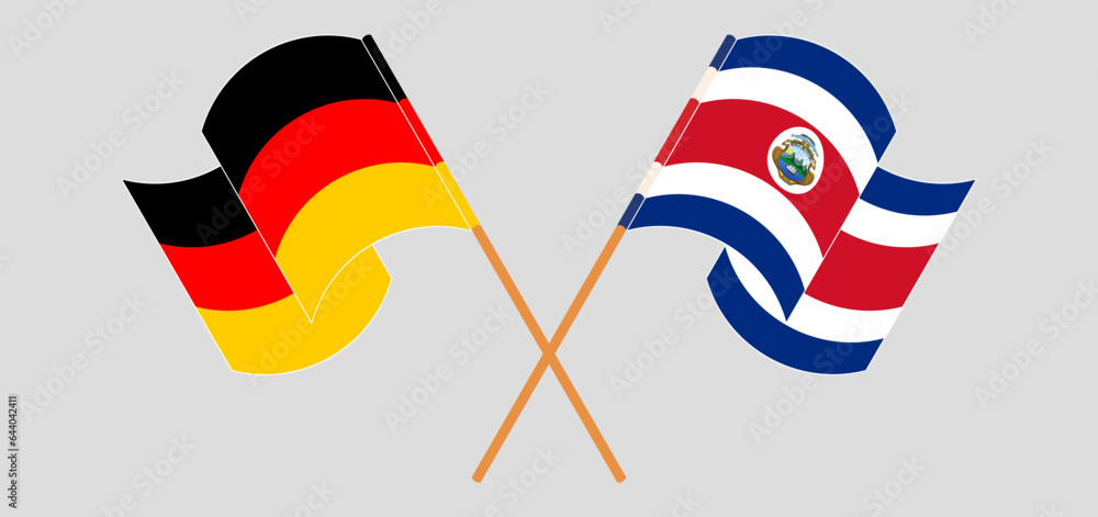 Crossed and waving flags of Germany and Costa Rica Crossed and waving flags of Germany and Costa Rica