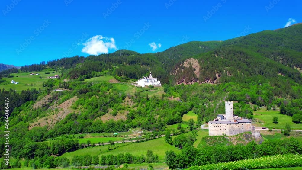 Marienberg Monastery - Vinschgau in South Tyrol - a fantastic aerial shot of the white monastery on the mountain Marienberg Monastery - Vinschgau in South Tyrol - a fantastic aerial shot of the white monastery on the mountain