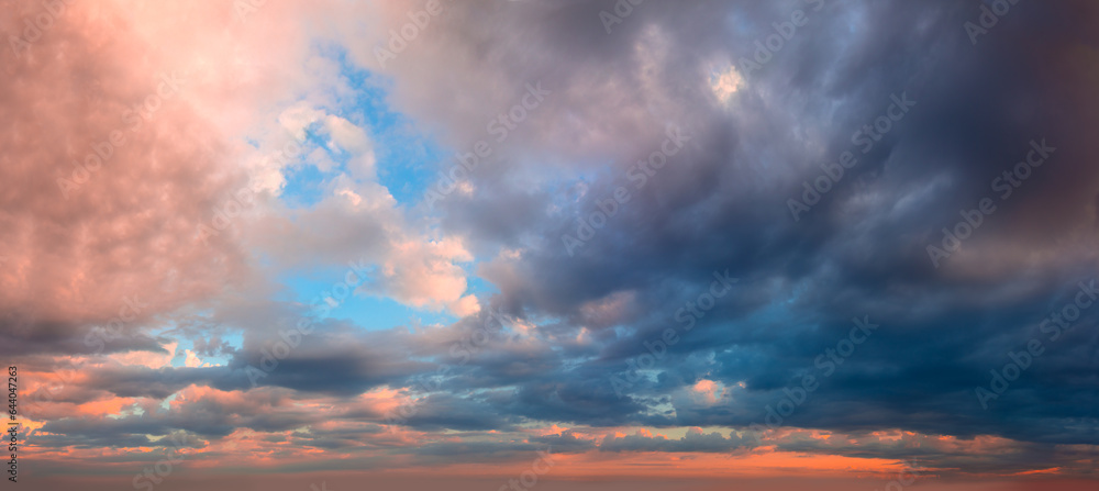 Stormy Dramatic Sky - Vibrant colors Pof Real Sky - Panoramic Sunrise Sundown Sanset Sky with colorful clouds. Without any birds.  Natural Cloudscape background.