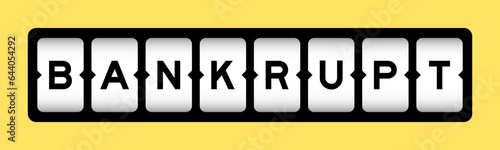 Black color in word bankrupt on slot banner with yellow color background