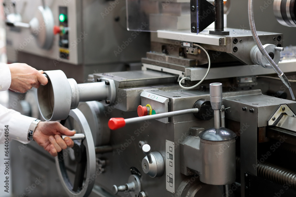 engineer setting up metalworking lathe engineer setting up metalworking lathe