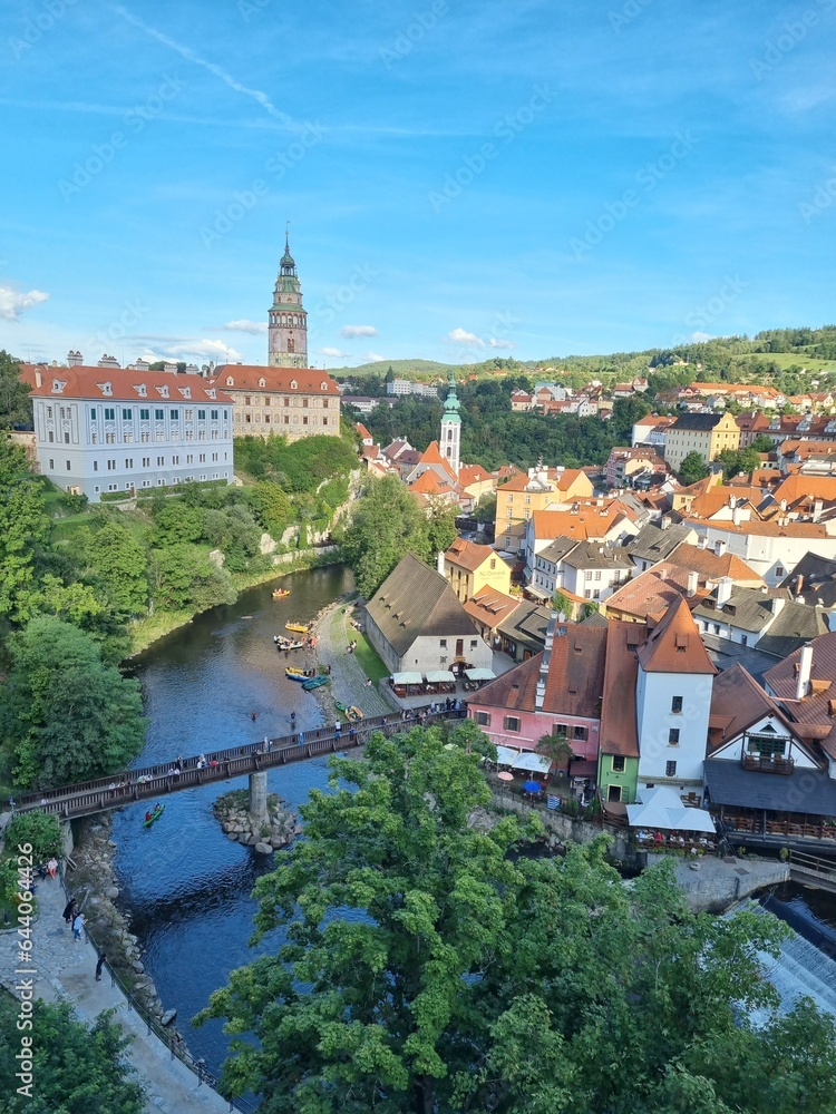 View of historical centre of Cesky Krumlov town on Vltava riverbank on autumn day overlooking medieval Castle, Czech Republic. View of old town of Cesky Krumlov, South Bohemia, Czech Republic.
