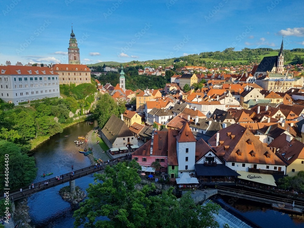Panoramic view of Cesky Krumlov with St Vitus church in the middle of historical city centre. Cesky Krumlov, Southern Bohemia, Czech Republic.
