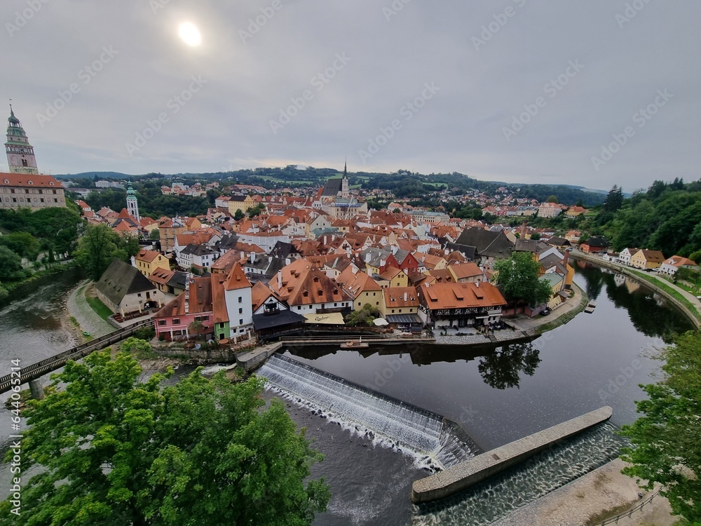 Panoramic view of Cesky Krumlov town on Vltava riverbank on autumn day overlooking medieval Castle, Czech Republic. View of old town of Cesky Krumlov, South Bohemia, Czech Republic.
