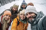 cropped shot of an unrecognizable group of friends posing for a selfie in the snow