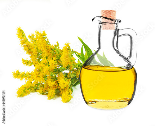 goldenrod oil in a bottle isolated on a white background