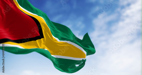 Bild auf Leinwand Close-up view of the Guyana national flag waving in the wind