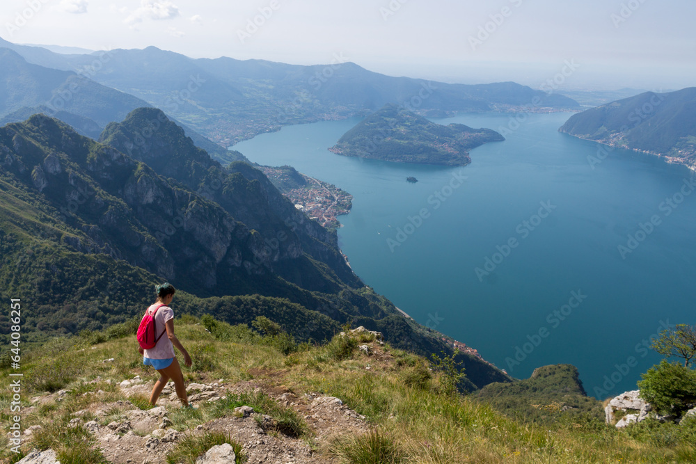 Hiker on the top of mountain near Iseo