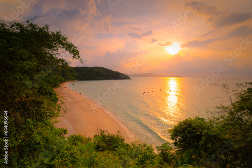 Landscape view of sun set or sun raise over the beach with sand beach and bay sea.