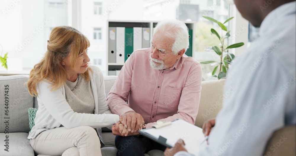 Obraz premium Counseling, support and senior couple with therapist in consultation for help, talk or crisis guidance. Therapy, depression and old people holding hands consulting marriage or mental health expert