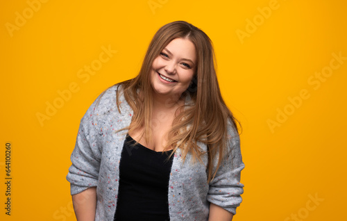 Plus size woman smiling and looking at camera © kegfire