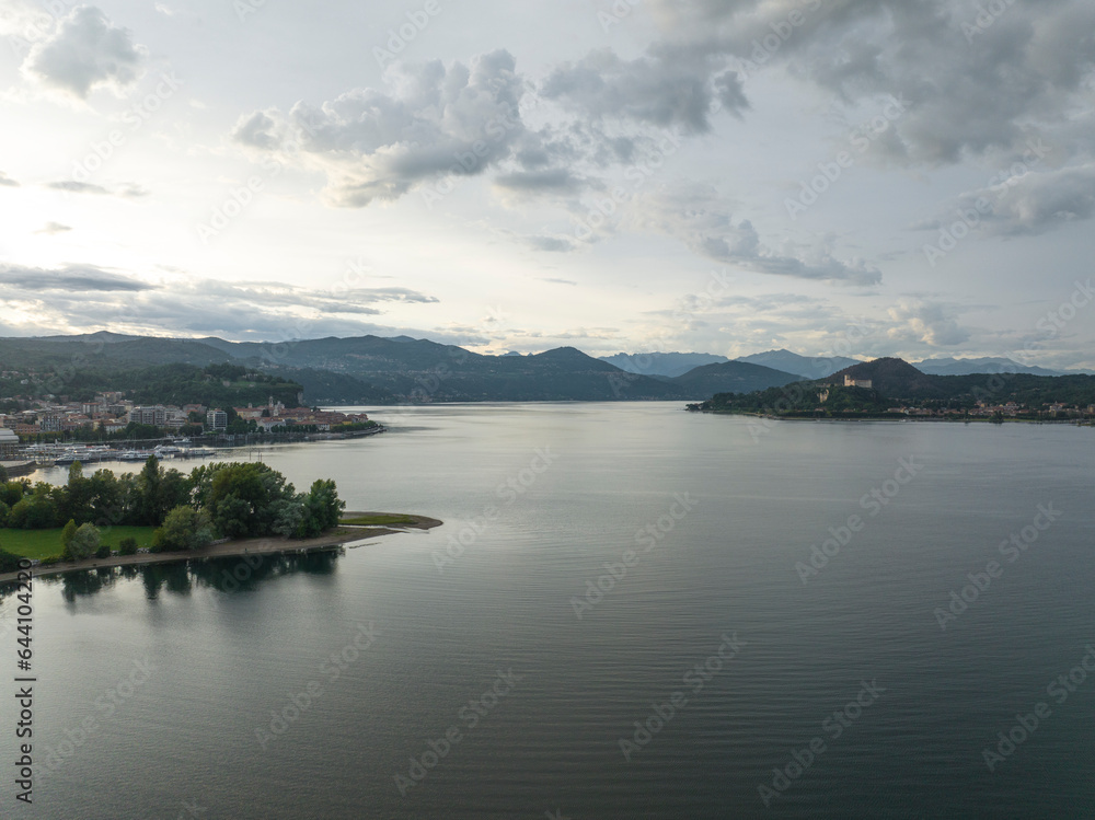 Aerial view of Lago Maggiore (Lake Maggiore) at sunset, Arona, Novara, Piedmont, Italy. Aerial view of Lago Maggiore (Lake Maggiore) at sunset, Arona, Novara, Piedmont, Italy.