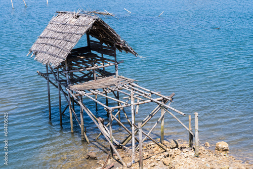Landscape of wooden hut on water