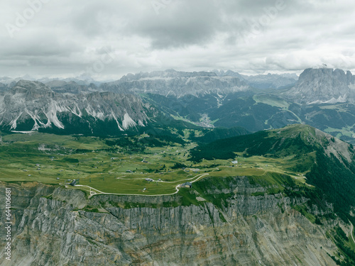 Aerial view of Seceda, a popular mountain peak on the Dolomites in the Odle/Geisler Group situated within Puez-Odle Nature Park in South Tyrol in Northern Italy. photo