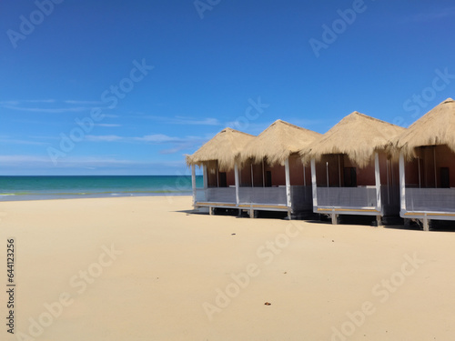 Tropical beach with luxury  straw beach huts