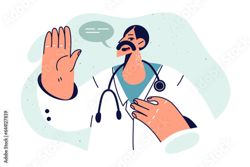 Man doctor pronounces hippocratic oath and raises hand promising to do everything to save patient