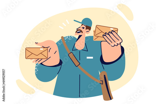 Postal man holds envelopes with letters, working as mail courier for state postal company