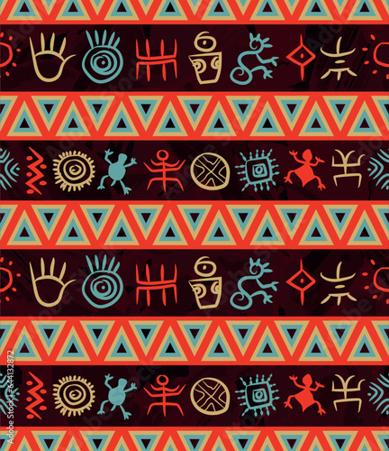 Multicolor geometric native south american indigenous pattern with colorful petroglyphs over a dark red marble effect at background