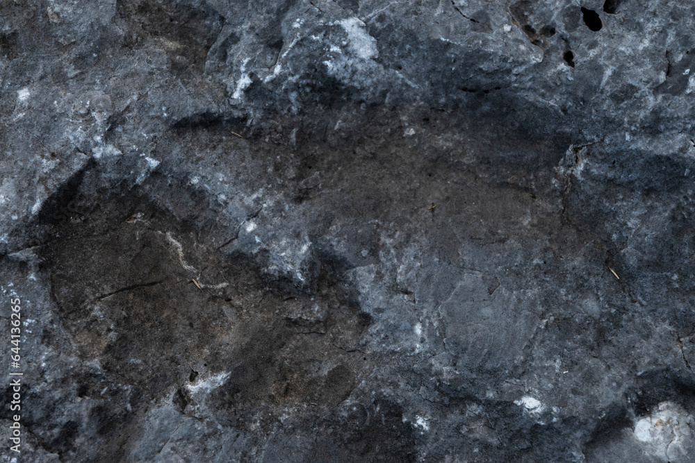 Close up of stony surface, texture weathered background
