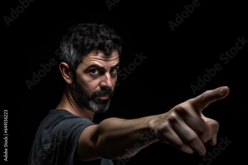 a cropped studio shot of a man holding up his finger © Alfazet Chronicles