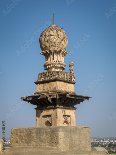 Parrot sitting on the side pillars of Golghumbaj-the mausoleum of king Mohammed Adil Shah, Sultan of Bijapur photo