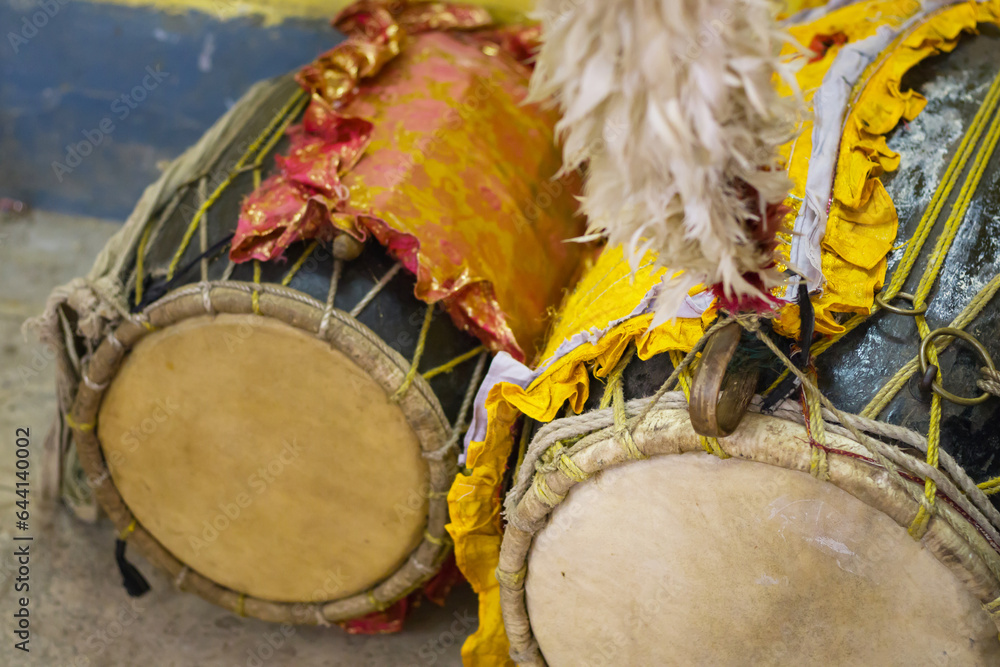 Dhak is a traditional membranophone musical instrument played during