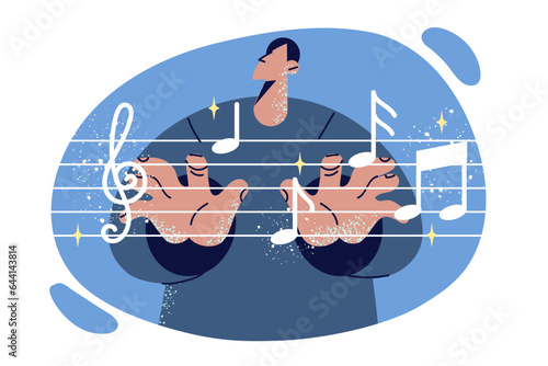 Man composer stands near notes symbolizing art of music or work in symphony orchestra