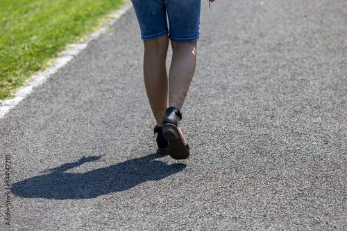 person walking on the road