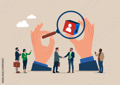 Business people with  magnifying glass and cube block. Human resources management. Recruitment business. 