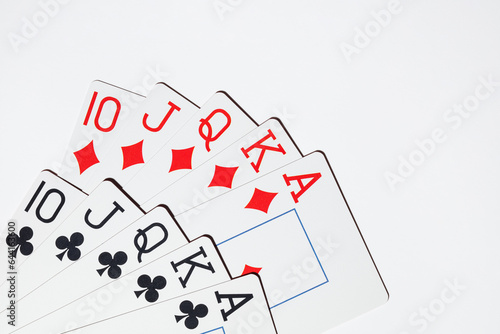 Playing cards on a white background. Top view. Royal flush hand of cards. Playing cards poker casino.